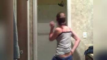 video of Chick dancing and stripping  in the bathroom