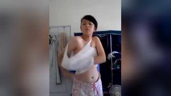 video of asian strip and play in her bathroom