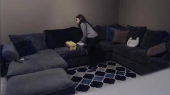 video of Horny brunette babysitter masturbating with toy on the couch  hidden cam