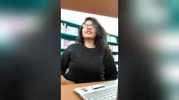 video of Flashing her boobs in college library