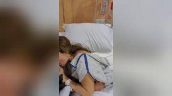 video of Girl in hospital giving a quick blowjob while laying in her bed
