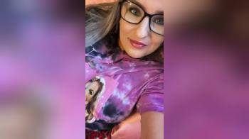 video of unusual tit drop by hottie with glasses