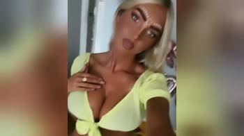video of tanned blonde festival ready
