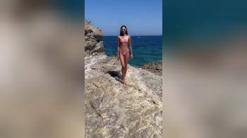 video of tanned body in bikini