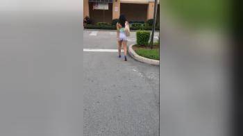 video of following girl in shorts