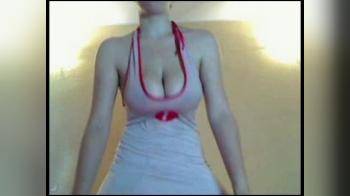video of Nurse costume flashing and oiling herself up