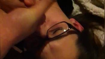 video of nerdy girl gets facial again laying down