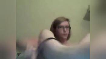 video of Hot nerdy girl playing with her hairbrush