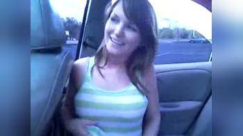 video of Young girl flashing her tits in car on parkingspot