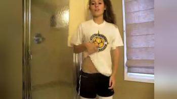 video of Very cute college chick stripping on bathroom