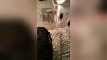 video of Big wife playing wit herself in laundry room