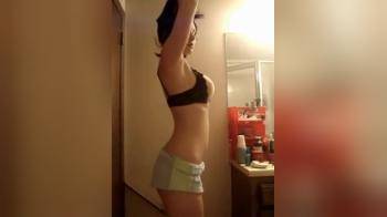 video of Cute Brun Striping naked