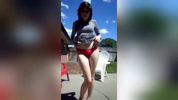 video of Outdoor presentation flashing her goods