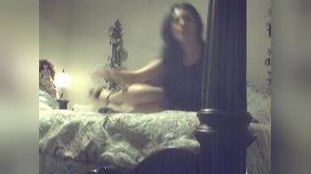 video of Stripping down naked on her bed