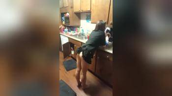 video of Bouncing her ass up an down in the kitchen