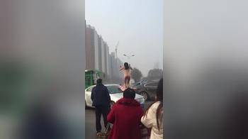video of Naked Asian City protest
