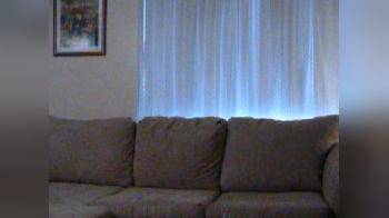 video of Stripping topless on the couch