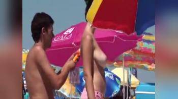 video of Huge tits topless beach