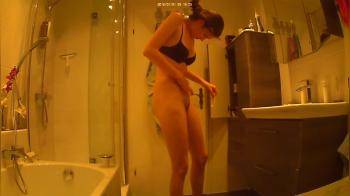 video of Hidden cam in bathroom of cute chick
