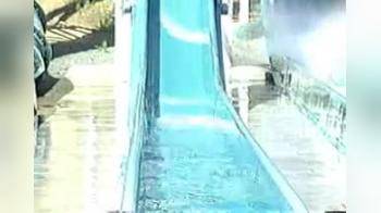 video of Hot Chick Topless After Her Ride On The Slide. 