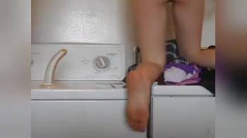video of Sucking dildo in Laundryroom