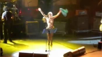 video of Topless Chick Jumps up on Stage