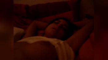 video of Playing with her tits while she is laying down
