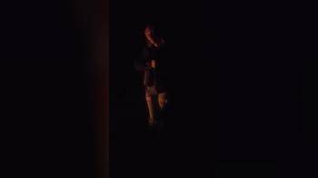 video of Flashing her tits at the campfire