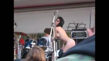 video of Topless Groupie On Stage