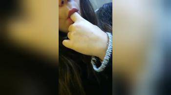 video of Sucking on her fingers in public