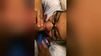 video of glasses girl laughing while sucking cock