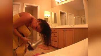video of Blowdrying her hair naked in bathroom