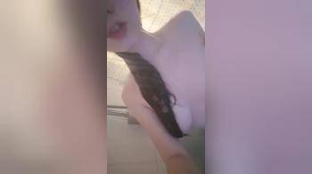 video of filming herself while showering