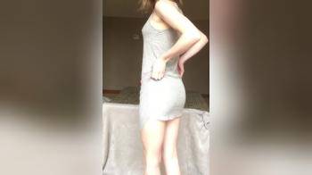 video of Pulling up her dress and flashes her hot body