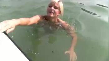 video of Blonde sucking and fucking in a rubber boat