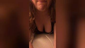 video of teasing with her mouth and cleavage