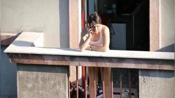 video of girl calling on balcony secretly filmed 