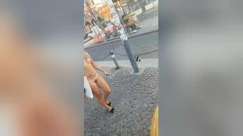 video of naked girl walking on street