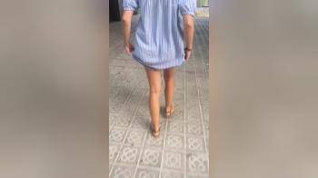 video of Butt flashing while walking down the street