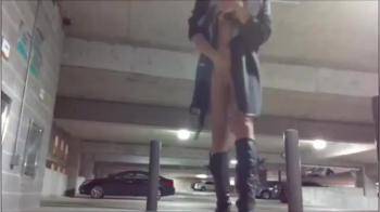 video of Skinny mature blonde flashing and bating in parking garage