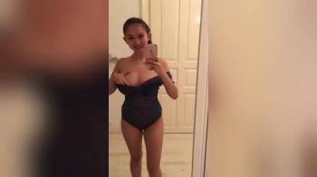 video of petite asian cutie flashing her big tits