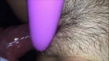 video of using her toy while getting fucked in her hairy pussy