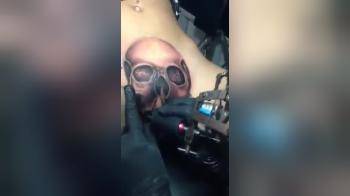 video of tattoeing skull on pussy