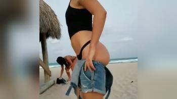 video of girl trying to get her ass in her shorts again