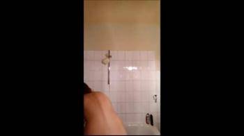 video of Undressing hot girl in shower shaving legs
