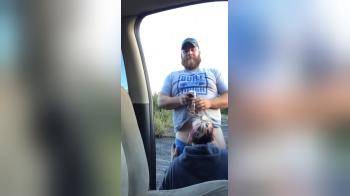 video of bearded man gets sucked outside the car