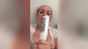 video of Moaning with a deodorant bottle in her pussy