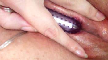 video of Close up vib coming out while she cums