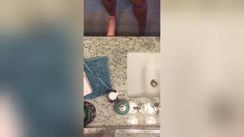 video of Fucking her dildo in the bathroom