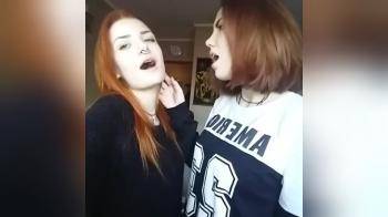 video of Two hot redheads kissing passionately 